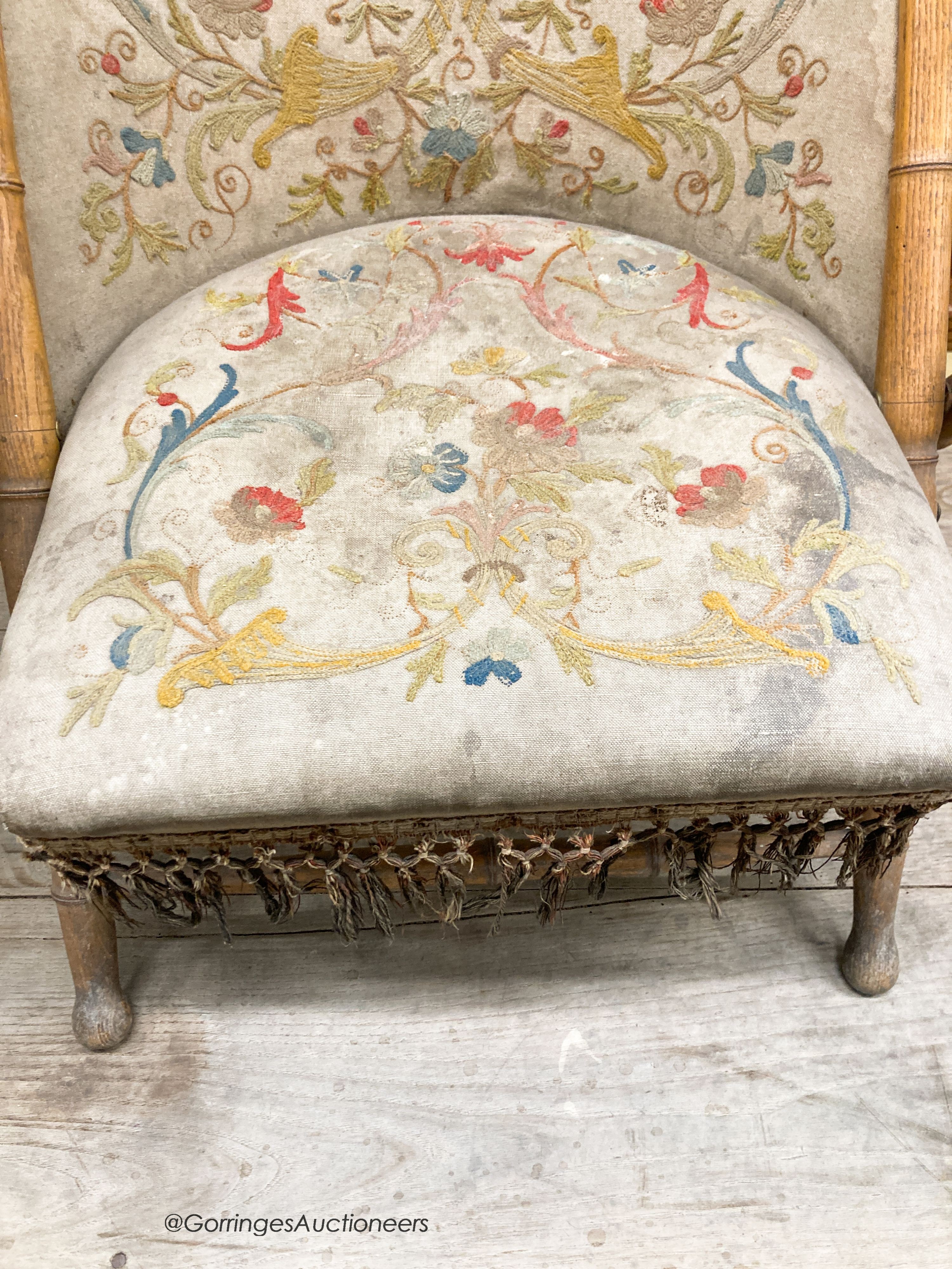 A Victorian faux bamboo folding chair with tapestry upholstery, W.66cm D.50cm H.90cm